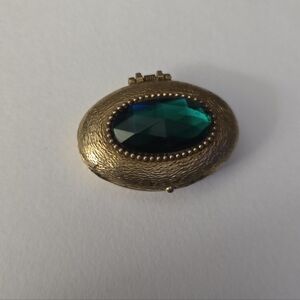 Vintage emerald green rhinestone hinged solid perfumeVintage emerald green